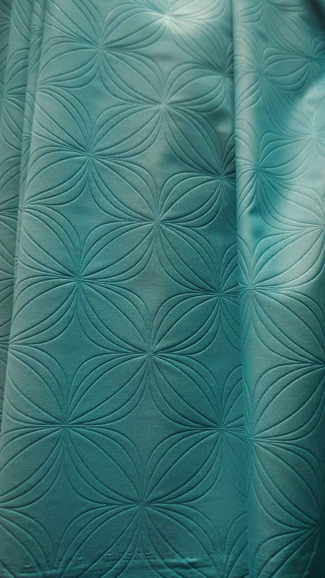 Embossed polyester microfiber fabric - deep flower emboss pattern in teal