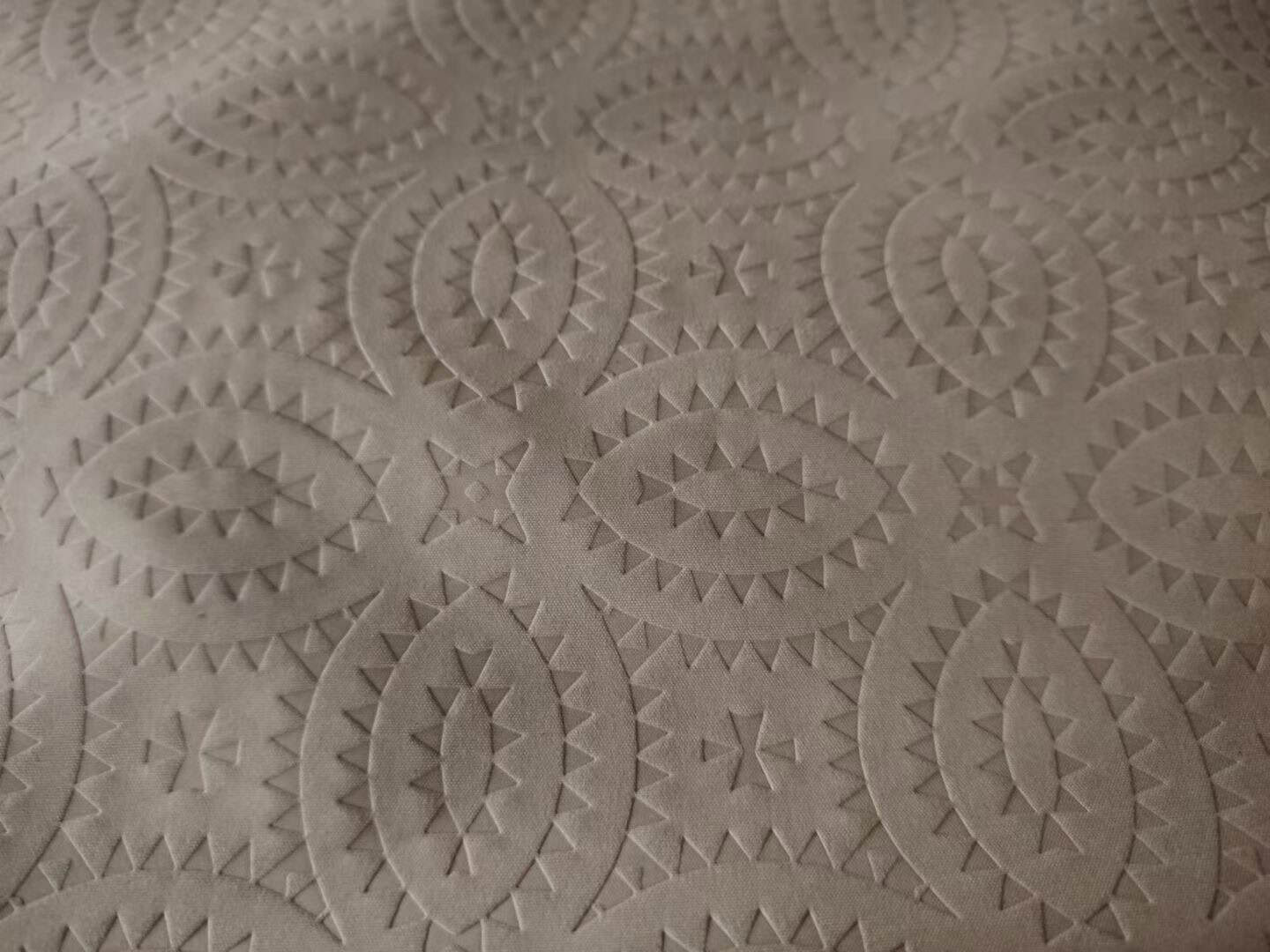 Embossed polyester microfiber fabric - sunburst pattern in beige