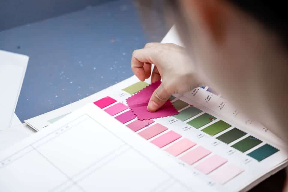 Fabric swatch book used for shade and color reference during quality control