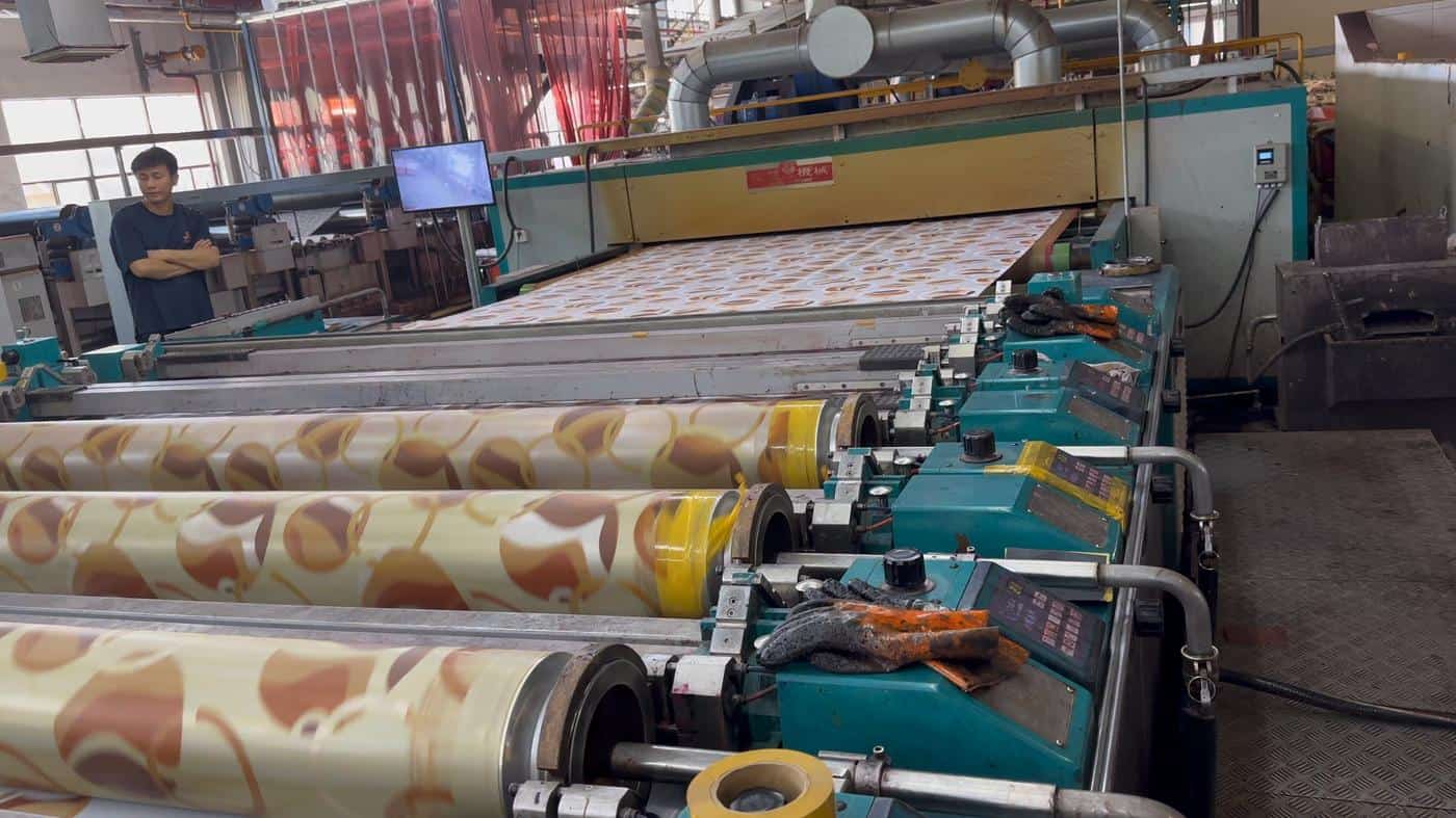 Polyester microfiber fabric moving through a printing production line
